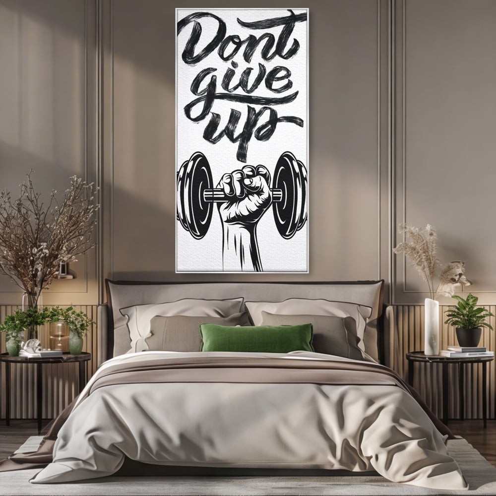 Tablou canvas cu ilustratie motivationala cu halterofil si mesaj, in rama de aluminiu argintiu, pe perete intr-un dormitor